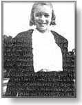 Norma Jean als 11 anys amb un aparell corrector de les dents (3645 bytes)