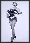 Marilyn amb una guitarra (6946 bytes)